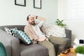 Feverish guy feeling unwell at home Royalty Free Stock Photo