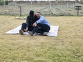 Latin man and woman couple in their 40s without children spends a day of rest having a picnic in a vineyard enjoying quality time