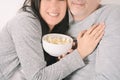 Latin middle-aged couple eating popcorn and watching a movie Royalty Free Stock Photo