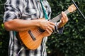 Latin musician playing a guitar at the street in Mexico city Royalty Free Stock Photo