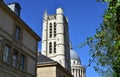 Lycee Henri IV Clovis Bell Tower with the Pantheon Dome from Rue Descartes. Paris, France. Royalty Free Stock Photo