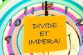 Latin quote Divide et impera meaning Divide and conquer.