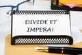 Latin quote Divide et impera meaning Divide and conquer. the best method of governing