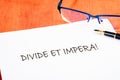 Latin quote Divide et impera meaning Divide and conquer. the best method of governing