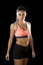 Latin sport woman posing in fierce and badass face expression with fit slim body Royalty Free Stock Photo