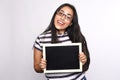 Latin woman holding chalkboard. Royalty Free Stock Photo