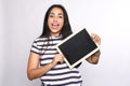 Latin woman holding chalkboard. Royalty Free Stock Photo