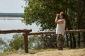 Latin woman looking through binoculars from a viewpoint, El Palmar National Park Royalty Free Stock Photo