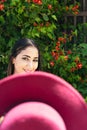 Latin Woman taking a selfie portrait with hat on the street - A happy guy smiling at the camera Royalty Free Stock Photo