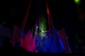 latin women dancing with colorful fabrics with lights of different shades at night, mexico Royalty Free Stock Photo