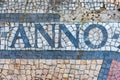 The latin word anno with mosaic stones