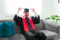 Handsome man preparing for his graduation at home Royalty Free Stock Photo