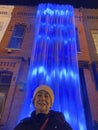 Latina at the Blue Waterfall at the Georgetown Glow Exhibit in December