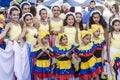 Latina dancers pose at festival