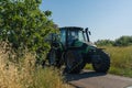 Tractor transporting sheaves in the fields in the province of Latina, Fronzinone in Italy