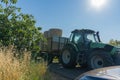 Tractor transporting sheaves in the fields in the province of Latina, Fronzinone in Italy