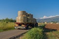 Tractor transporting sheaves in the fields in the province of Latina, Fronzinone in Italy