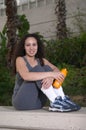 Latina with Orange Sports Water Bottle Royalty Free Stock Photo