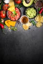 Latinamerican food party sauce guacamole, salsa, chips and tequi Royalty Free Stock Photo
