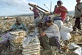 Latino boys collect old paper on landfill, Nicaragua