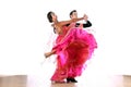 Latino dancers in ballroom Royalty Free Stock Photo