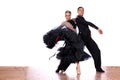 Latino dancers in ballroom Royalty Free Stock Photo