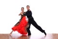 Latino dancers in ballroom against white background Royalty Free Stock Photo