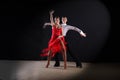 Latino dancers in ballroom isolated on black Royalty Free Stock Photo