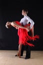 Latino dancers in ballroom isolated on black Royalty Free Stock Photo