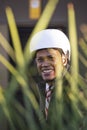 Latino ethnic businessman with bicycle helmet smiling looking at camera Royalty Free Stock Photo