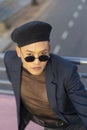 Latino gay male with makeup wearing trendy hat Royalty Free Stock Photo