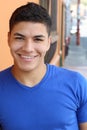 Latino male smiling headshot outdoors Royalty Free Stock Photo