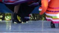 Latino women in colourful traditional dresses dancing Jarabe tapatio, mexican national folk hat dance. Street