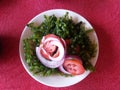Lato salad or seaweed salad with fresh Philippine seaweeds, sliced raw red tomatoes and sliced raw red onion