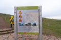 Informational sign in both Icelandic and English, explaining the dangers of hiking and