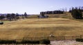 Latrobe, Pennsylvania, USA 3/23/2019 The brown, dead grass in spring on the Chuck Noll football field at St Vincent University