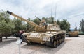 The visitor takes pictures of the child in the tank on the Memorial Site near the Armored Corps Museum in Latrun, Israel