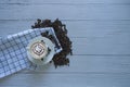 Latte art coffee in a coffee cup and Coffee beans with tablecloth beside top view isolated Royalty Free Stock Photo