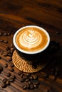 Latte Art on Wooden Table Royalty Free Stock Photo