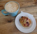 Latte Coffee & Cranberry Scone at Coffee Shop