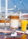 Latte coffee and orange juice Royalty Free Stock Photo