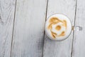 Latte macchiato coffee on white wooden background. Top view Royalty Free Stock Photo