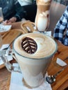 Latte Macchiato On A Glass Cup On A Wooden Table Royalty Free Stock Photo