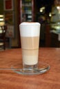 Latte Macchiato In Glass Cup On The Wooden Table Royalty Free Stock Photo