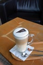 Latte Macchiato On Glass Cup On A Wooden Table Royalty Free Stock Photo