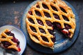 Lattice autumn fruit pie, with blackcurrant, blackberry, cherry compote in puff pastry pie