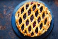 Lattice autumn fruit pie, with blackcurrant, blackberry, cherry compote in puff pastry pie