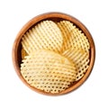 Lattice cut potato chips, salted crisps with grid pattern, in a wooden bowl