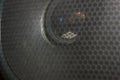 Lattice dynamics Musical apparatus Speaker grille Macro photo Dark background Royalty Free Stock Photo