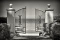 A lattice gate with sccess to the sea Royalty Free Stock Photo